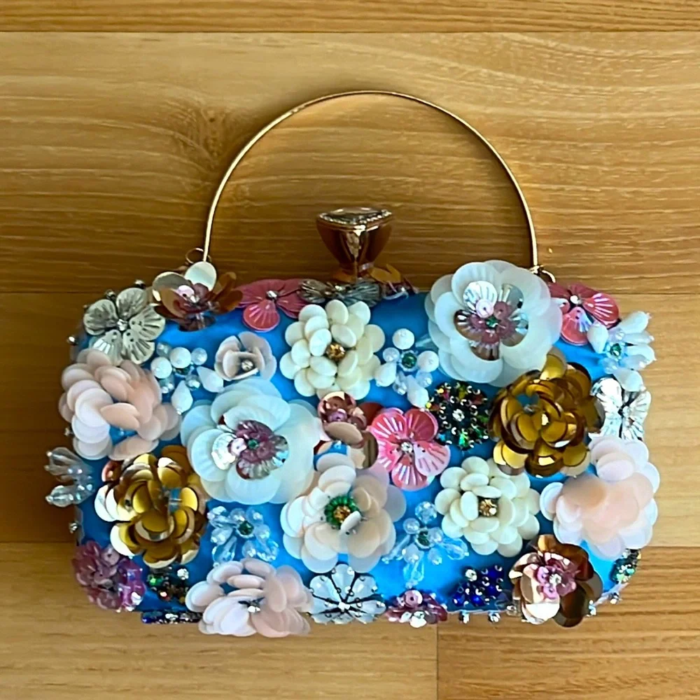 COPY - Bebe Sequenced Daisy Clutch - Picture 1 of 17